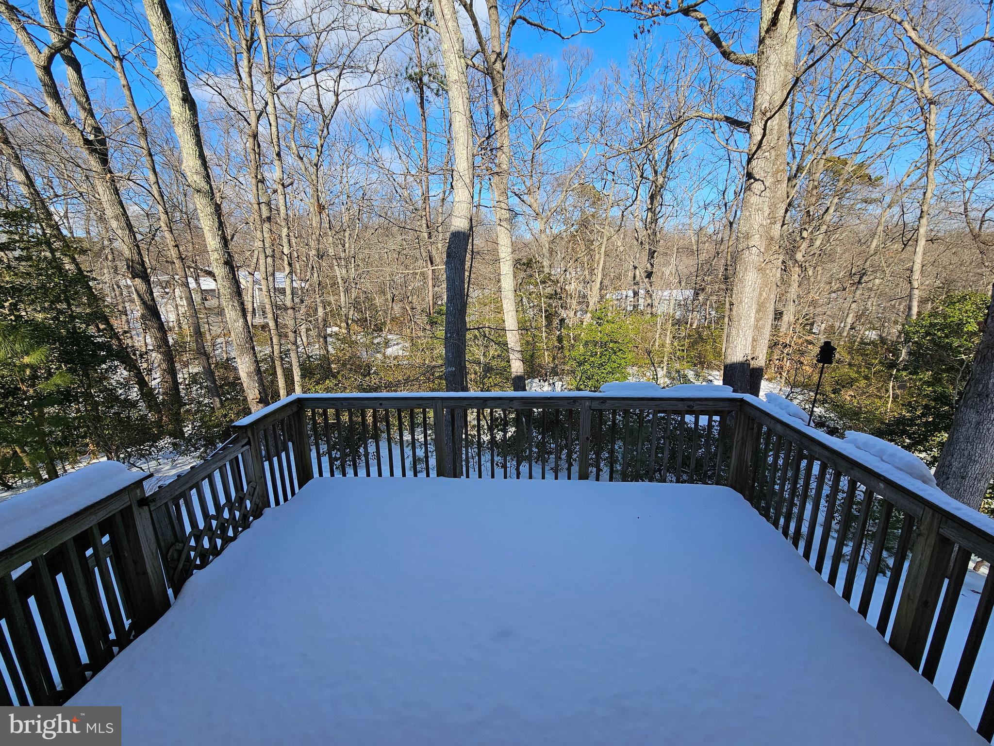 12560 Sagebrush Drive Lusby, MD 20657 - Photo 14 of 43 a view of balcony with wooden floor and fence