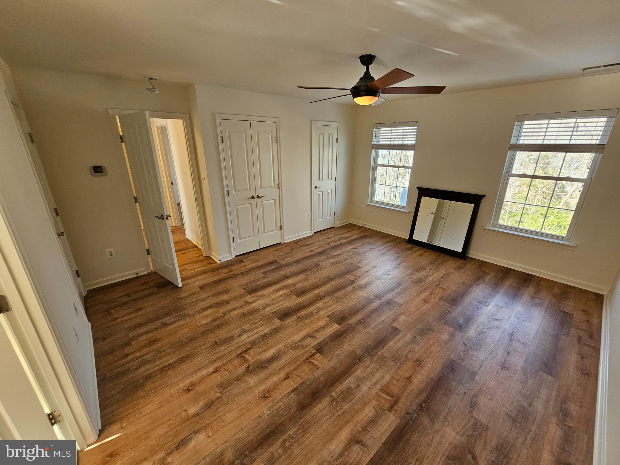 12560 Sagebrush Drive Lusby, MD 20657 - Photo 19 of 43 wooden floor in an empty room with a window