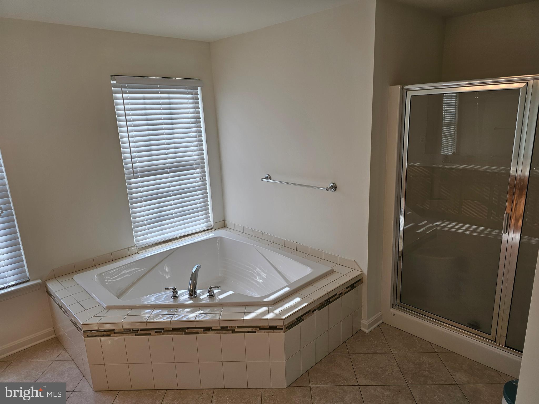 12560 Sagebrush Drive Lusby, MD 20657 - Photo 25 of 43 a bath tub sitting in a bathroom