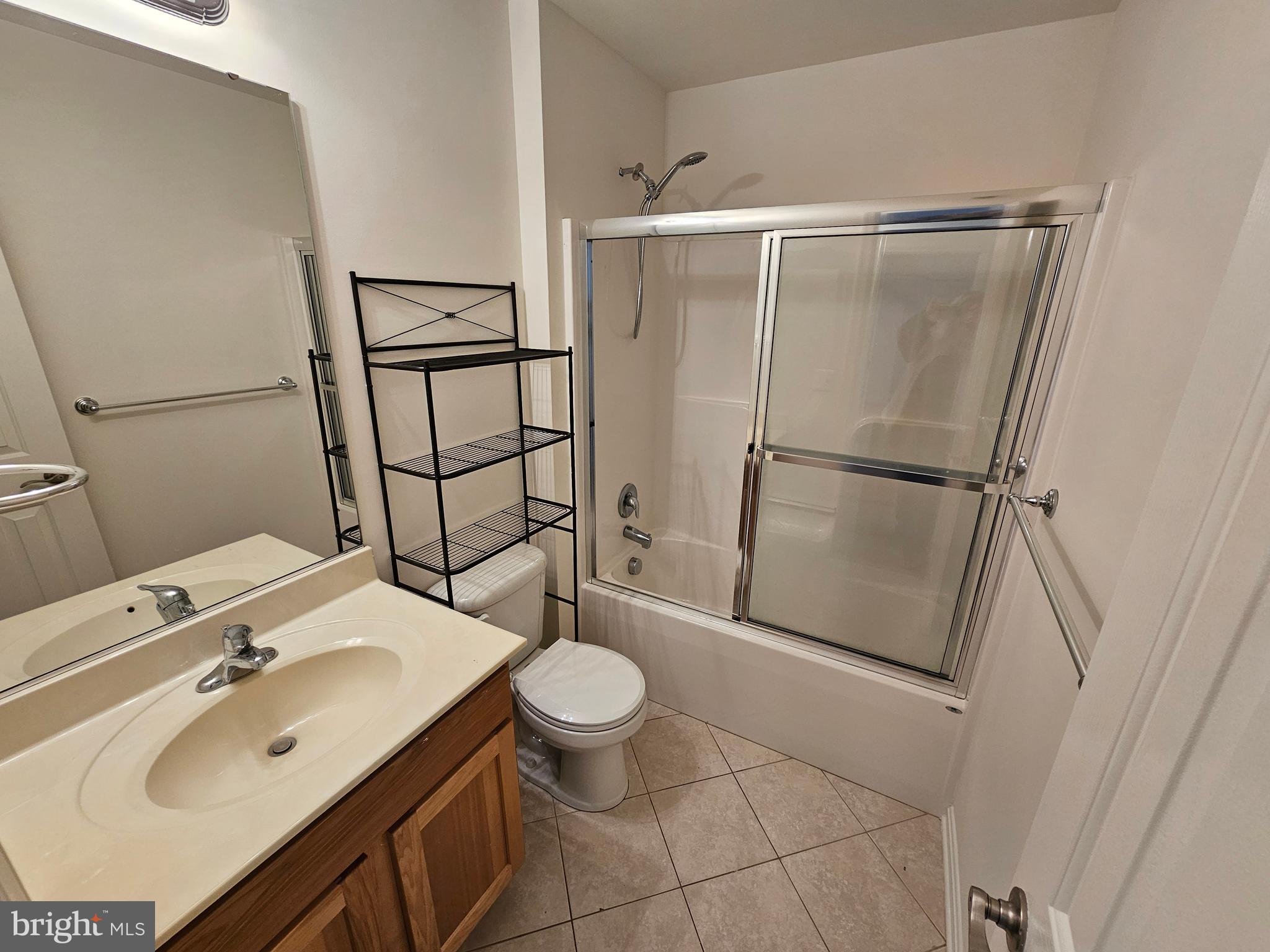 12560 Sagebrush Drive Lusby, MD 20657 - Photo 32 of 43 a bathroom with a sink toilet and shower