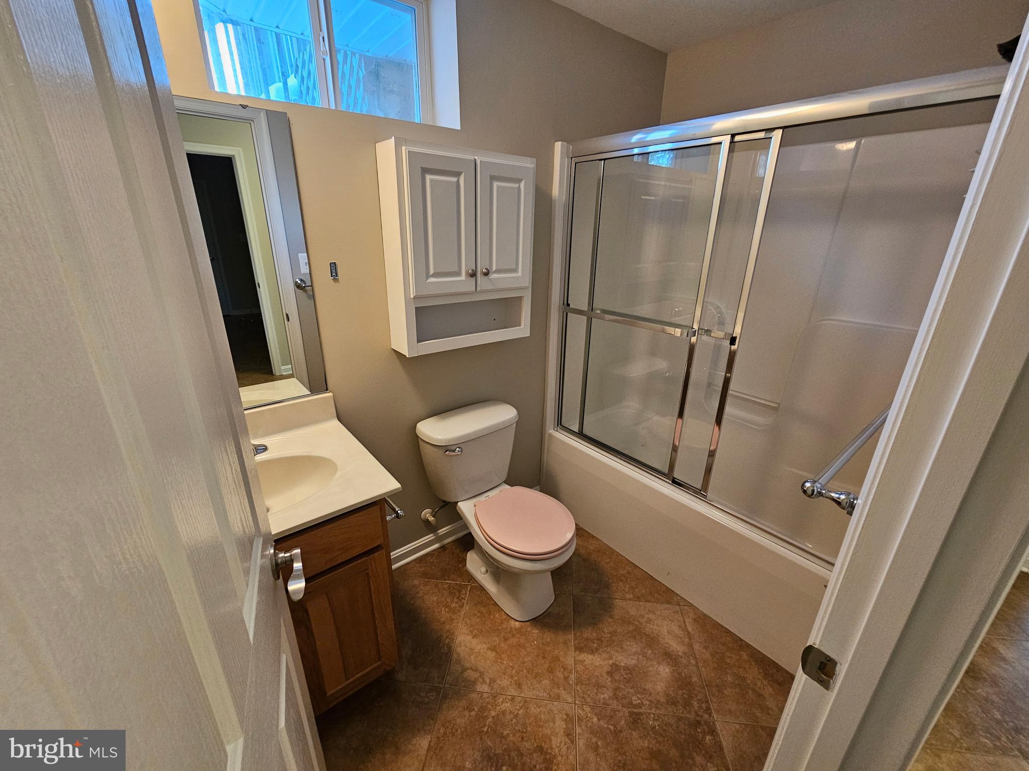 12560 Sagebrush Drive Lusby, MD 20657 - Photo 40 of 43 a bathroom with a toilet and a shower