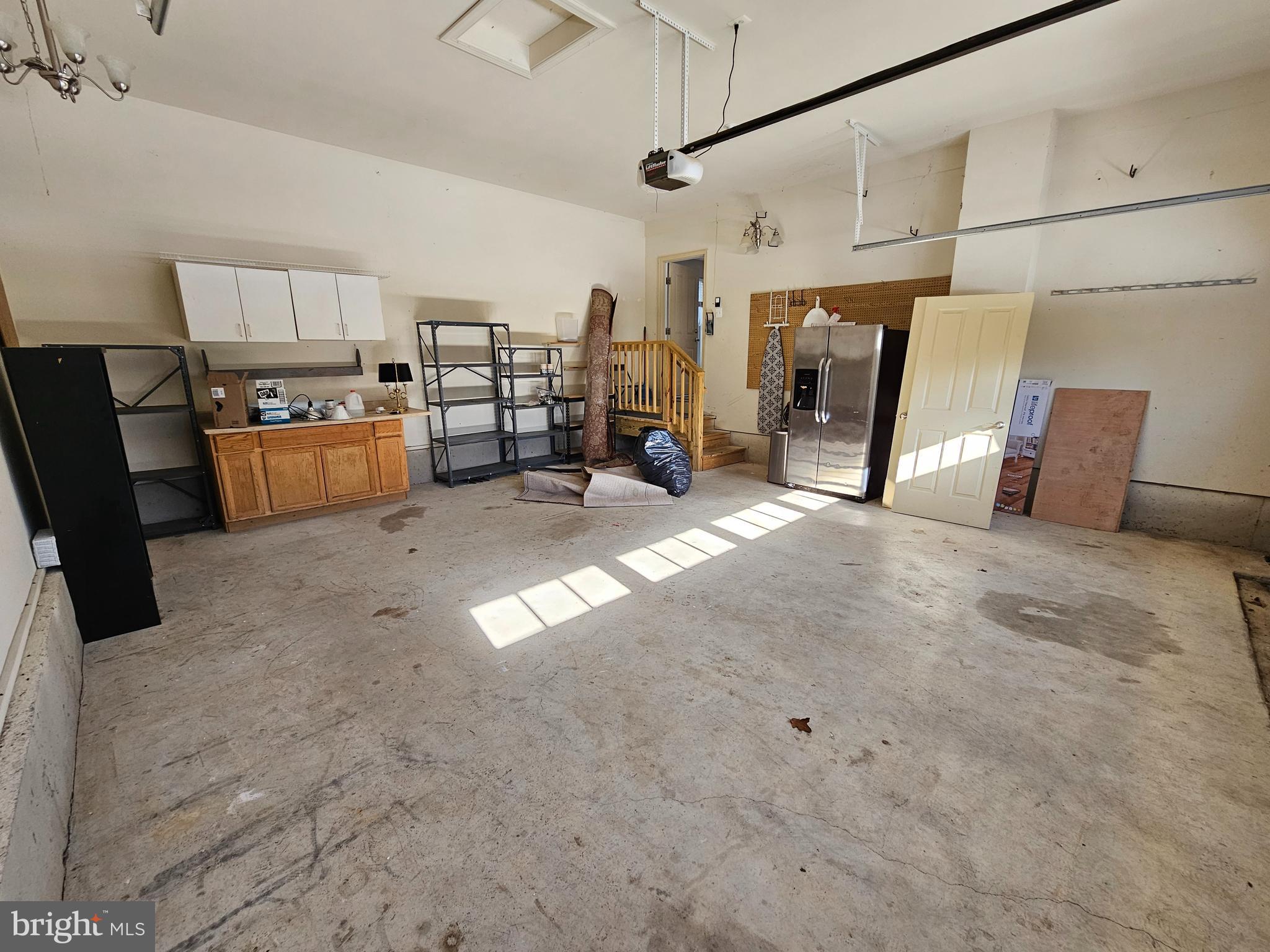 12560 Sagebrush Drive Lusby, MD 20657 - Photo 42 of 43 a view of a garage with furniture