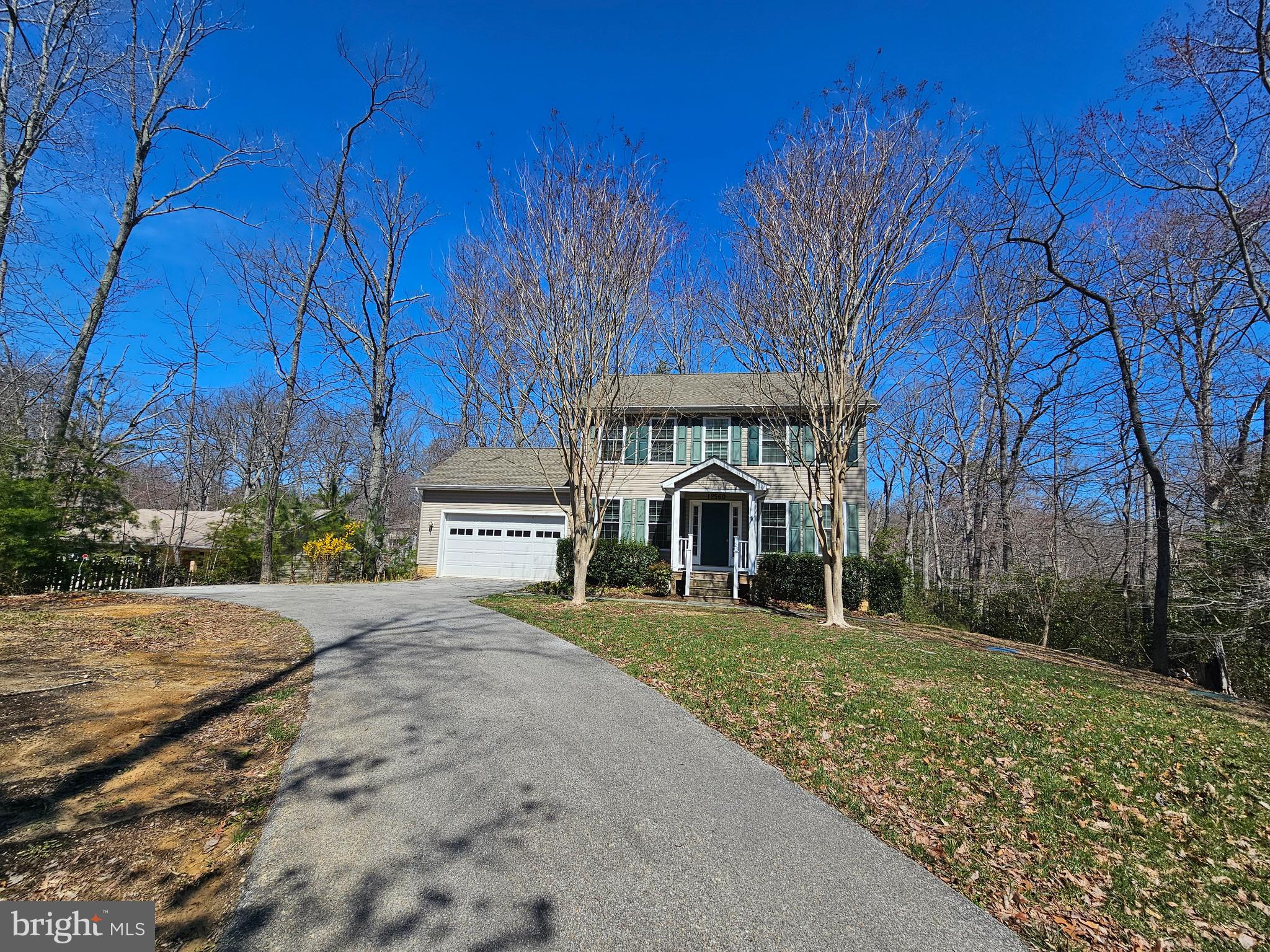 12560 Sagebrush Drive Lusby, MD 20657 - Photo 43 of 43 a view of house with outdoor space and garden