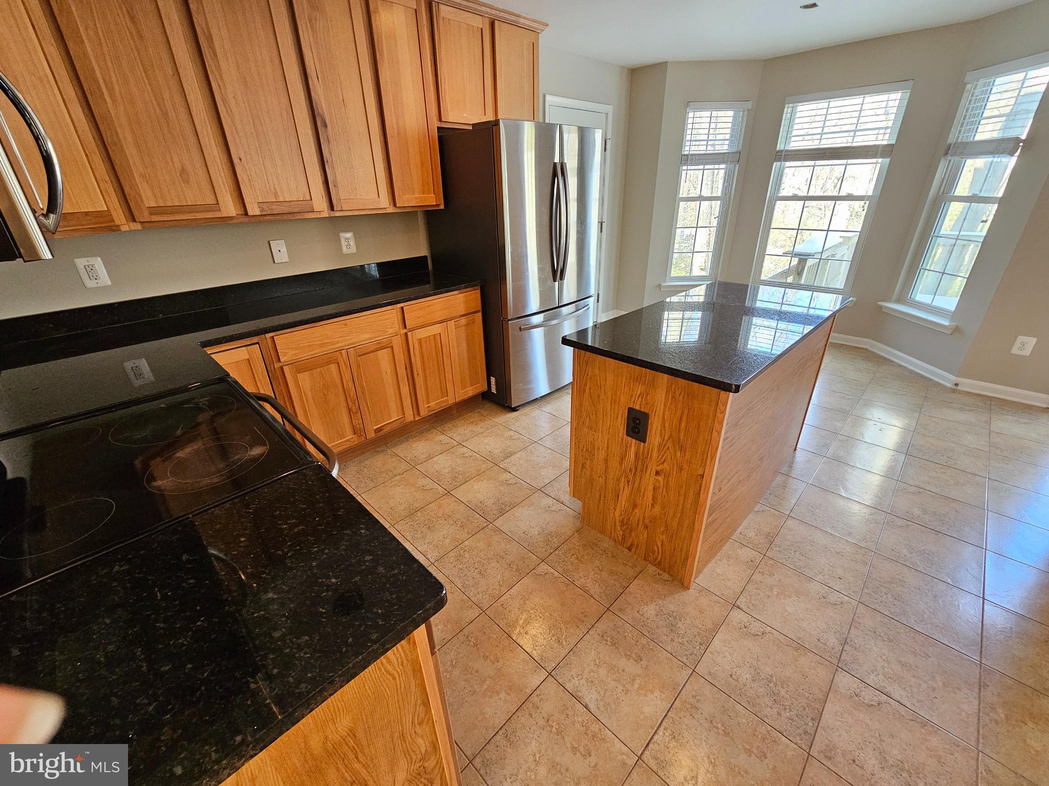 12560 Sagebrush Drive Lusby, MD 20657 - Photo 8 of 43 a kitchen with stainless steel appliances a counter space and a sink