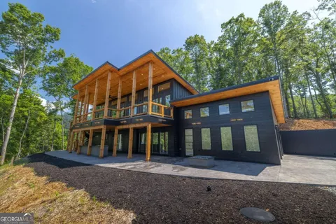 an aerial view of residential house with outdoor space