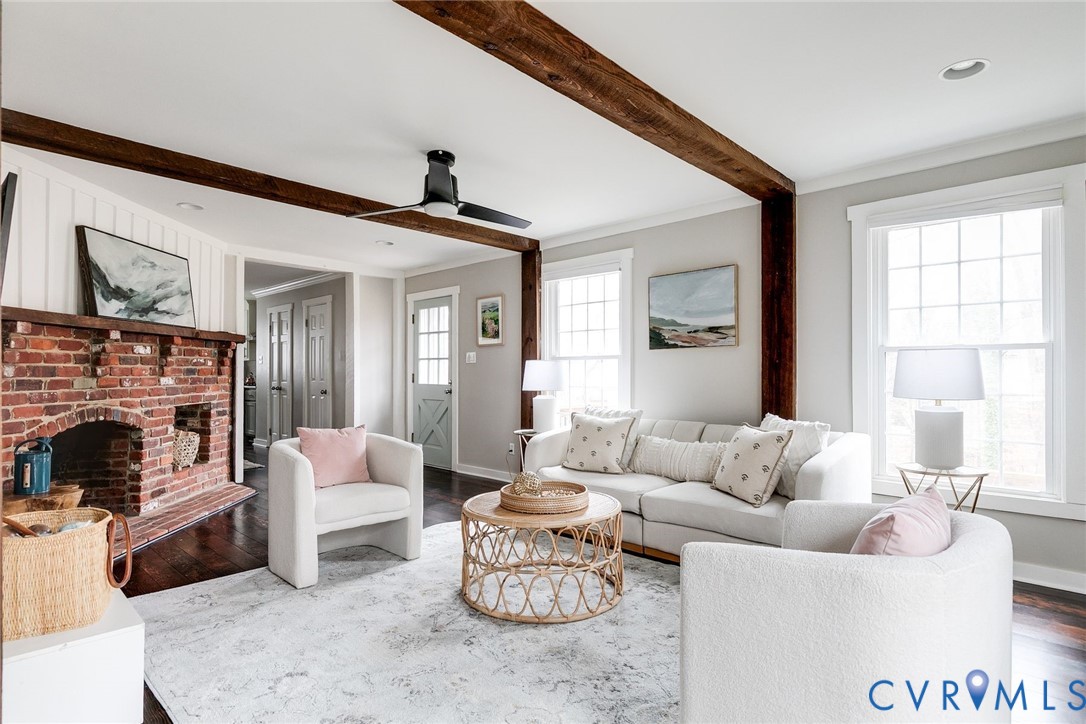 2831 Earlswood Road Midlothian, VA 23113 - Photo 21 of 47 a living room with furniture a fireplace and a large window