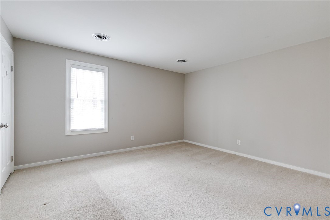 2831 Earlswood Road Midlothian, VA 23113 - Photo 31 of 47 an empty room with a window
