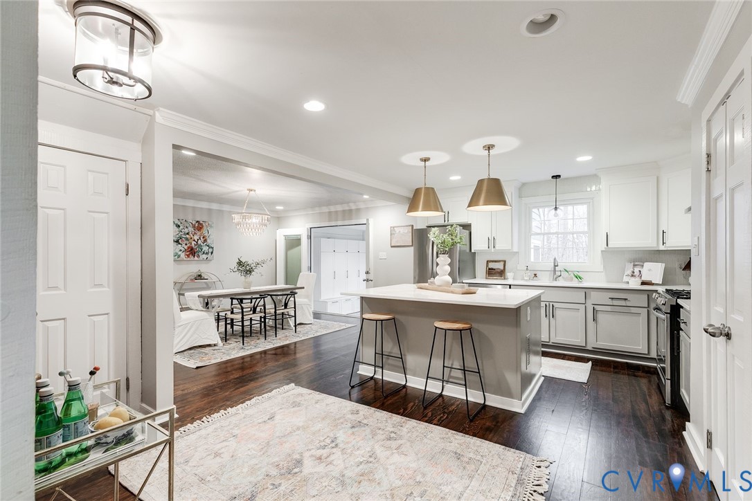 2831 Earlswood Road Midlothian, VA 23113 - Photo 9 of 47 a large kitchen with kitchen island a sink stainless steel appliances and cabinets