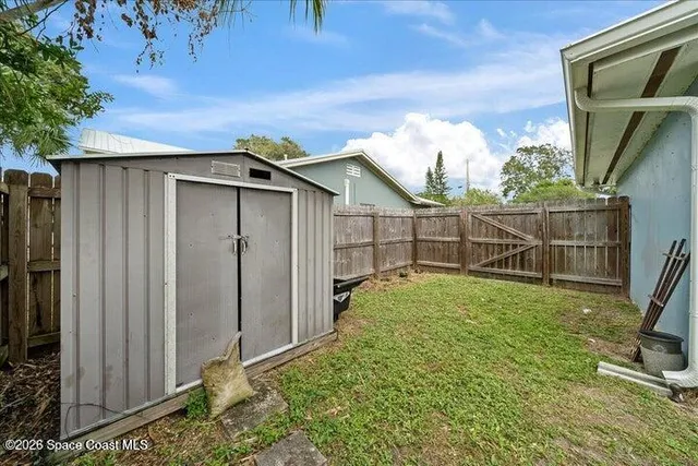 a view of a backyard with a garden