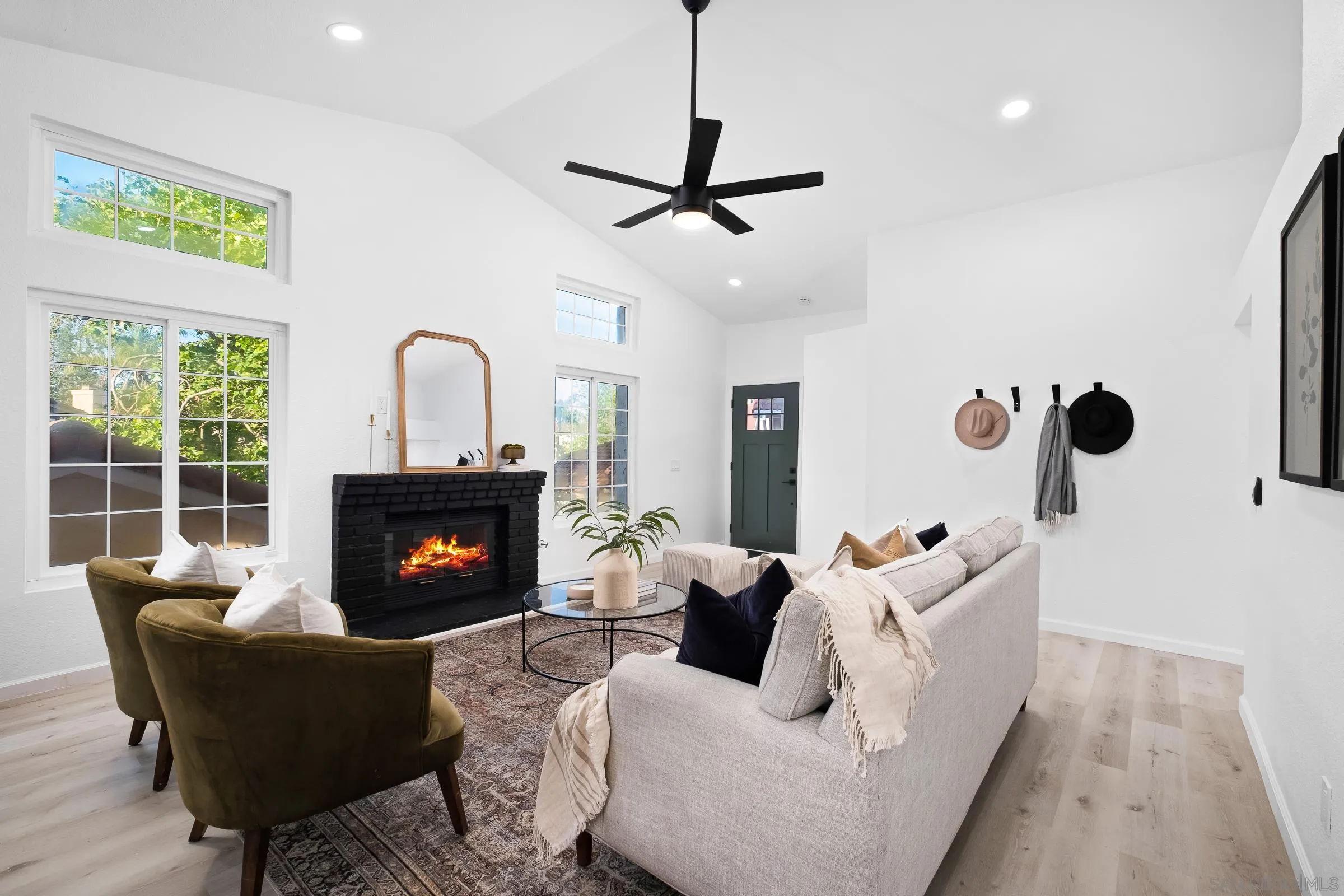 2457 Jasper Glen Escondido, CA 92029 - Photo 11 of 22 a living room with furniture and a fireplace