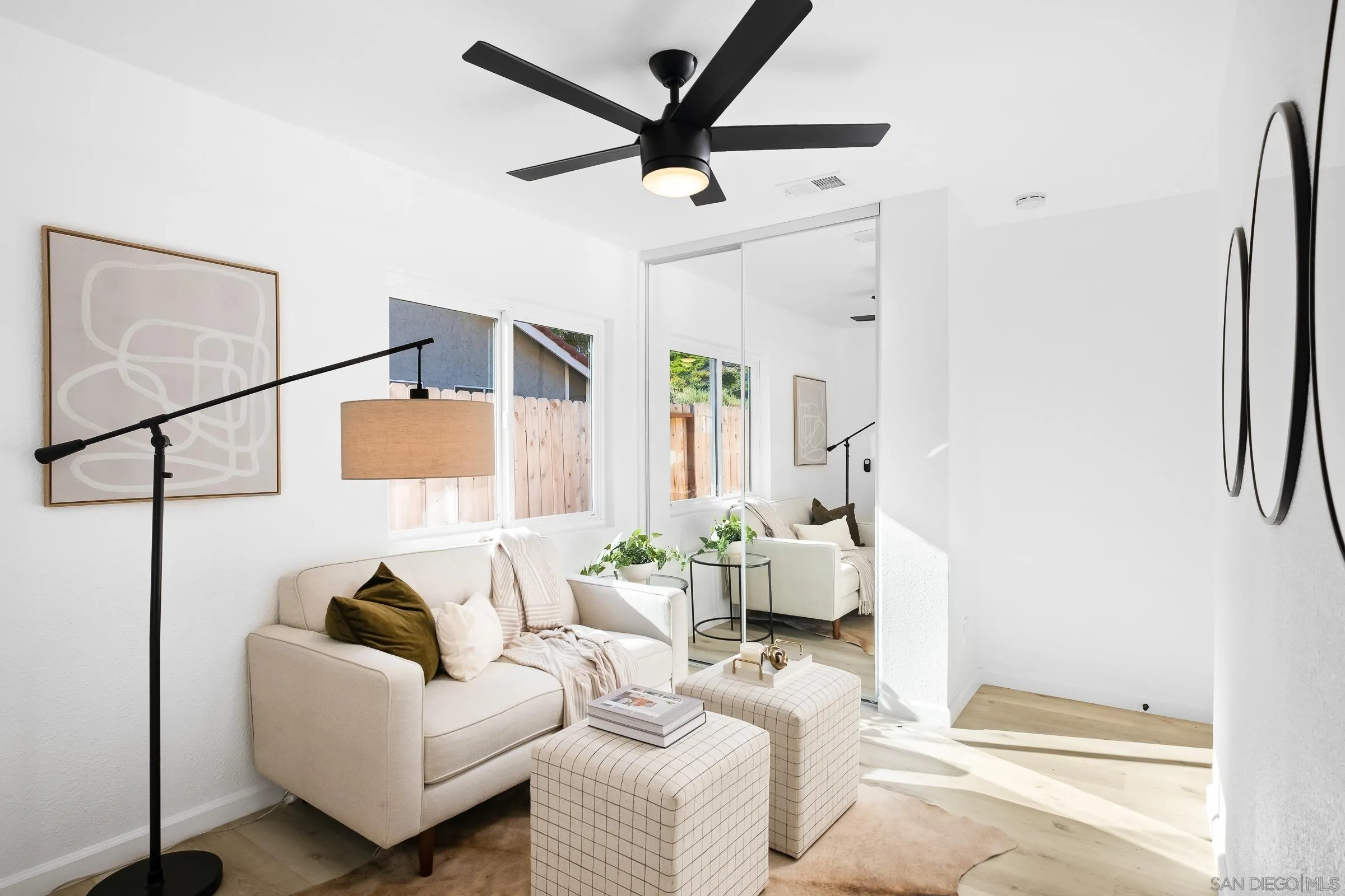 2457 Jasper Glen Escondido, CA 92029 - Photo 14 of 22 a living room with furniture and a ceiling fan