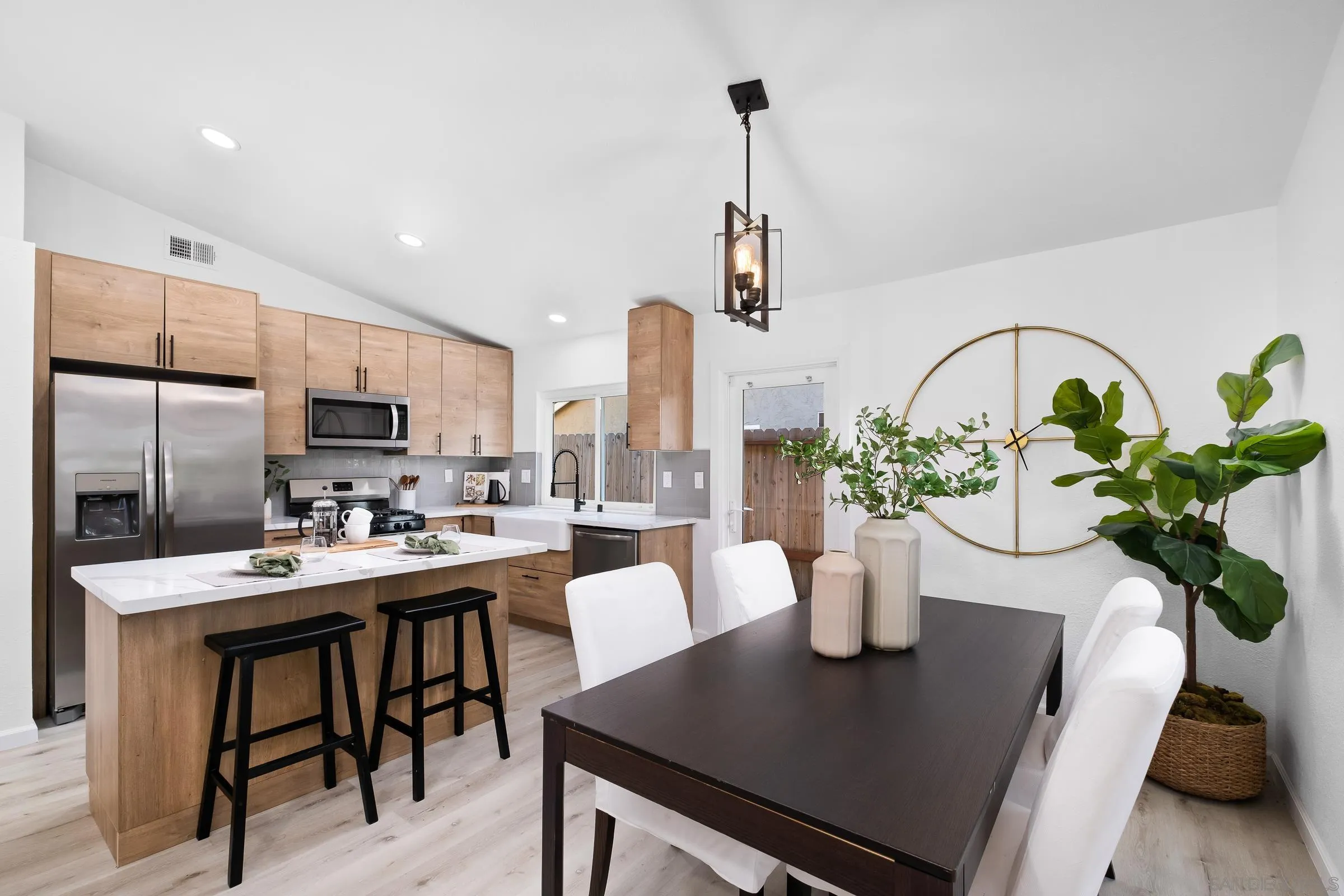 2457 Jasper Glen Escondido, CA 92029 - Photo 8 of 22 a view of a dining room with furniture