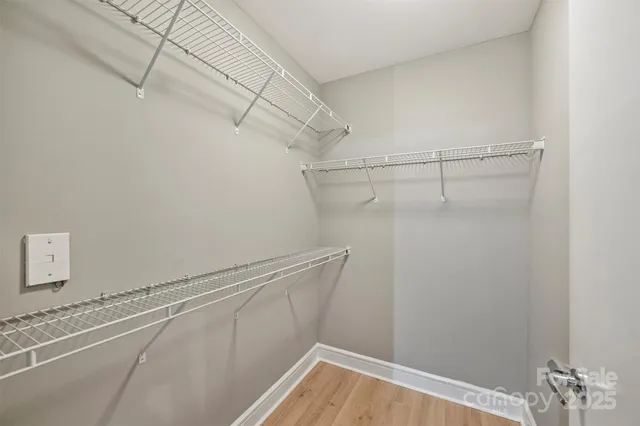 a view of a room with racks on the wall