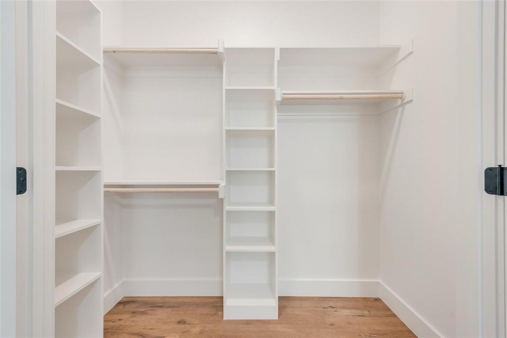 1807 Franklin Street Bonham, TX 75418 - Photo 6 of 13 a view of walk in closet with empty racks