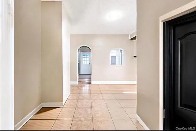 a view of an empty room and window