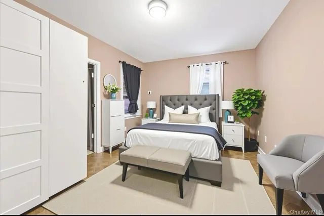 a bed room with a bed and a chair