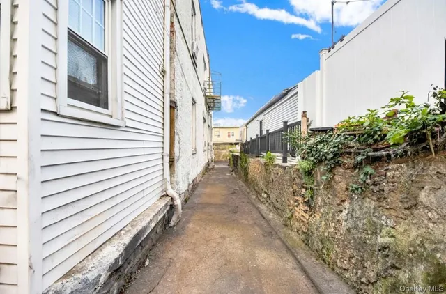 a view of a house with a street