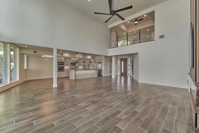 a view of a livingroom with wooden floor