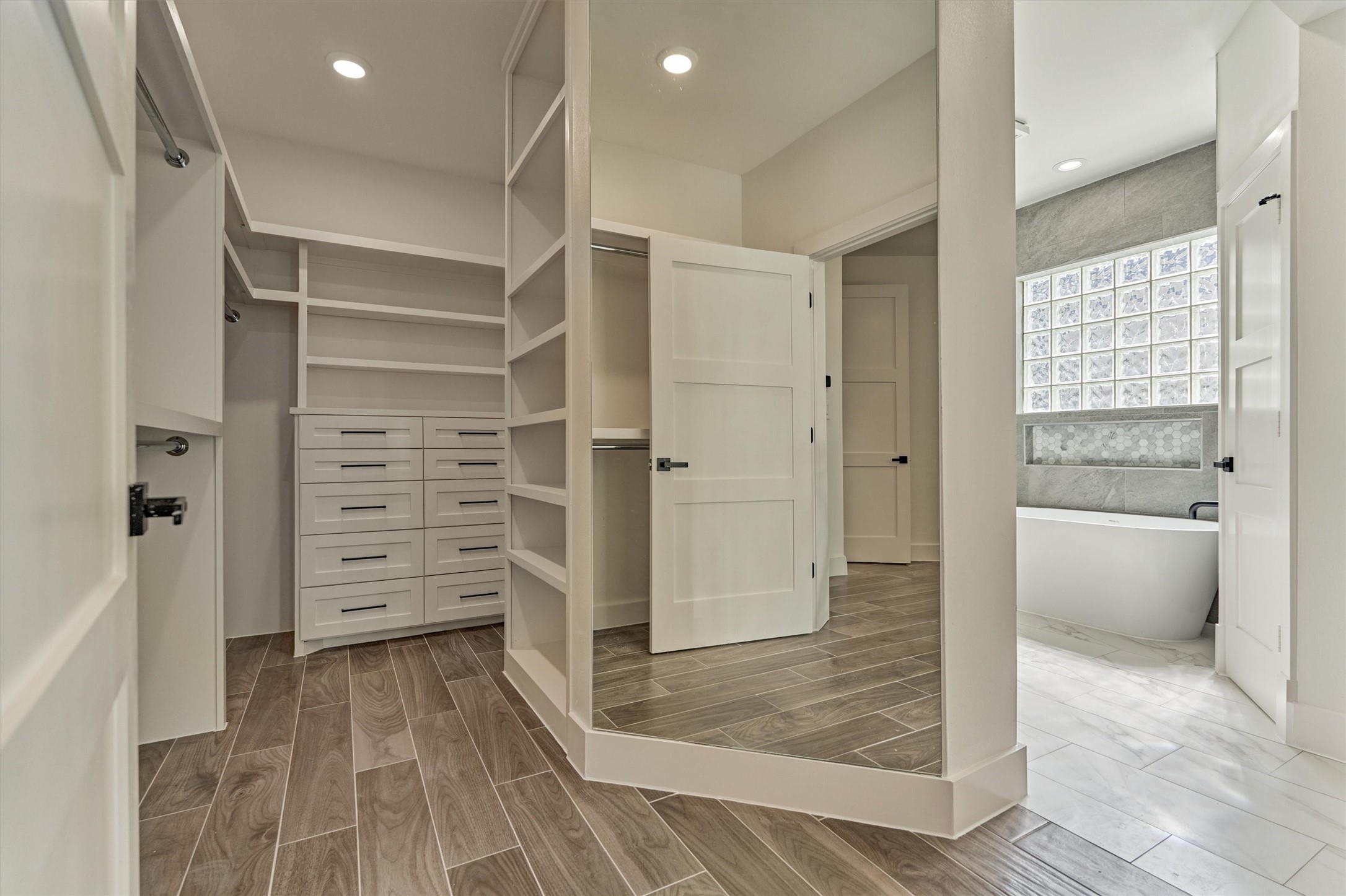 2811 Hemingway Drive Montgomery, TX 77356 - Photo 29 of 50 a view of walk in closet and bedroom view