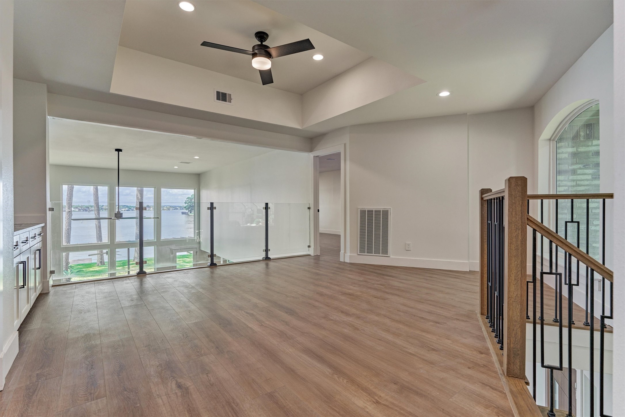 2811 Hemingway Drive Montgomery, TX 77356 - Photo 32 of 50 a view of an empty room with wooden floor and a window