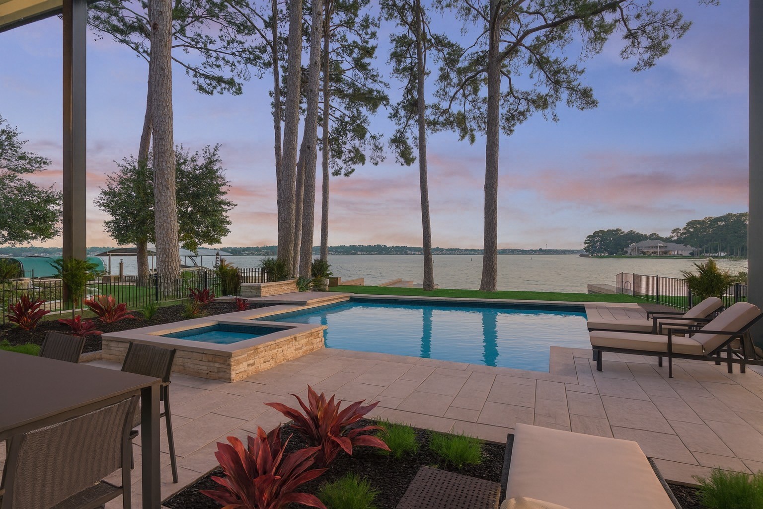 2811 Hemingway Drive Montgomery, TX 77356 - Photo 5 of 50 a view of a swimming pool with lounge chairs in the patio
