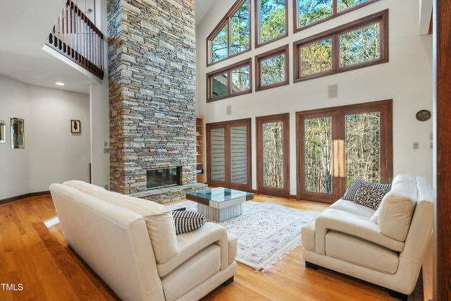 a large kitchen with lots of table and chairs