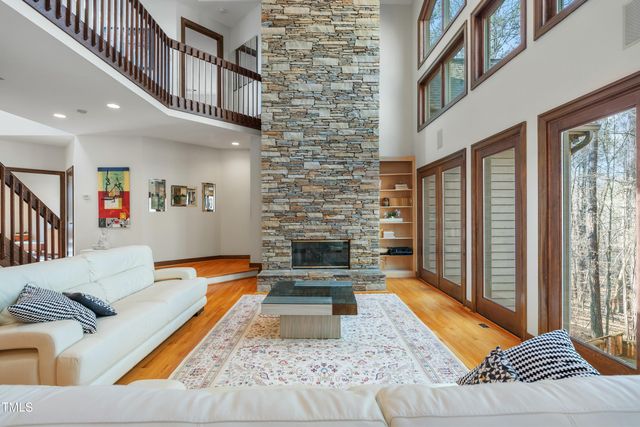 a kitchen with granite countertop a sink and a stove