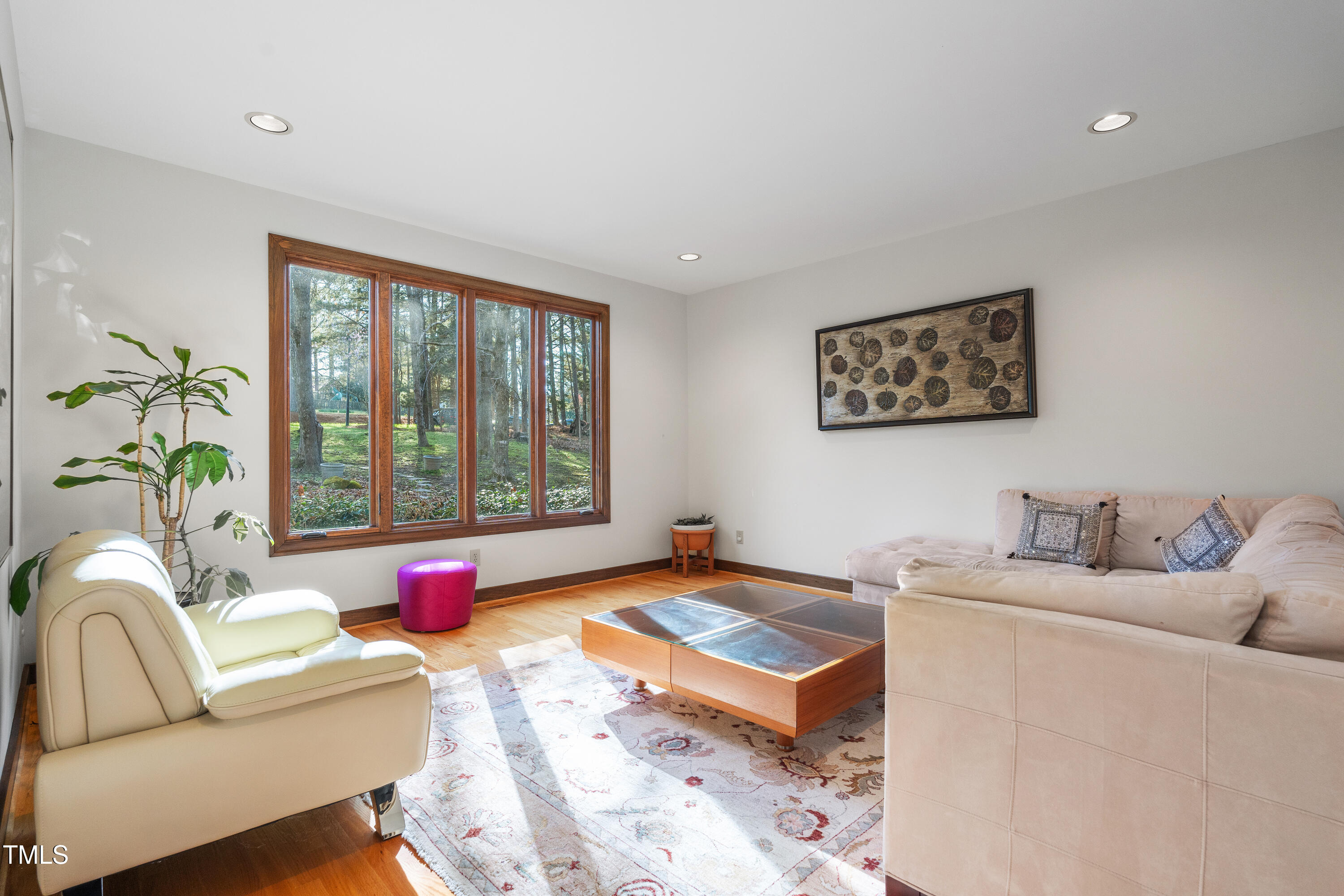 12117 Cliffside Circle Raleigh, NC 27614 - Photo 14 of 63 a living room with furniture and a large window
