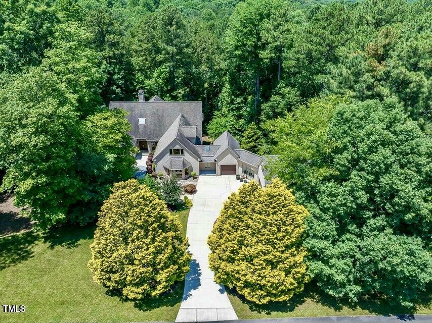 12117 Cliffside Circle Raleigh, NC 27614 - Photo 2 of 63 an aerial view of a house with large trees