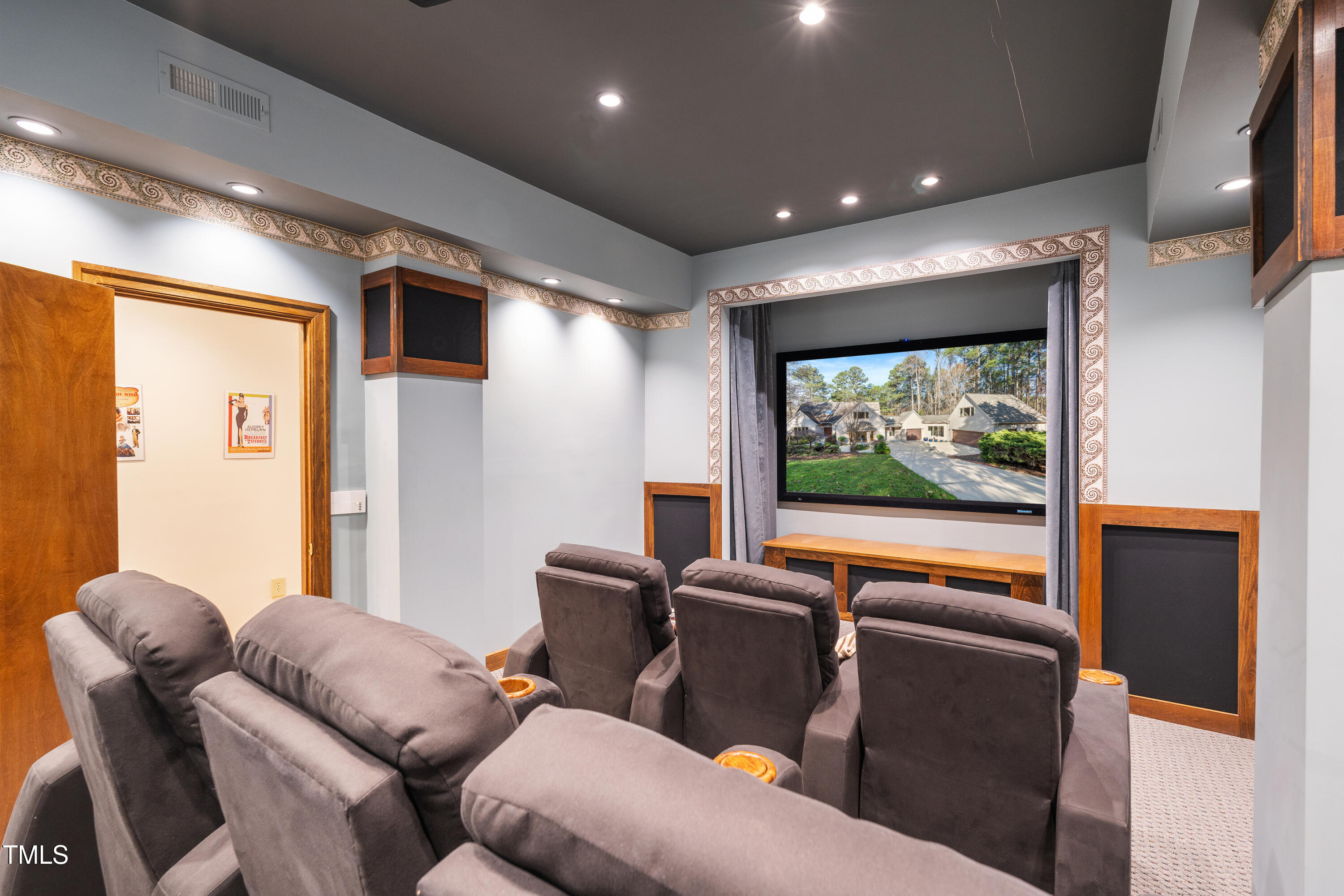 12117 Cliffside Circle Raleigh, NC 27614 - Photo 28 of 63 a living room with furniture and a flat screen tv