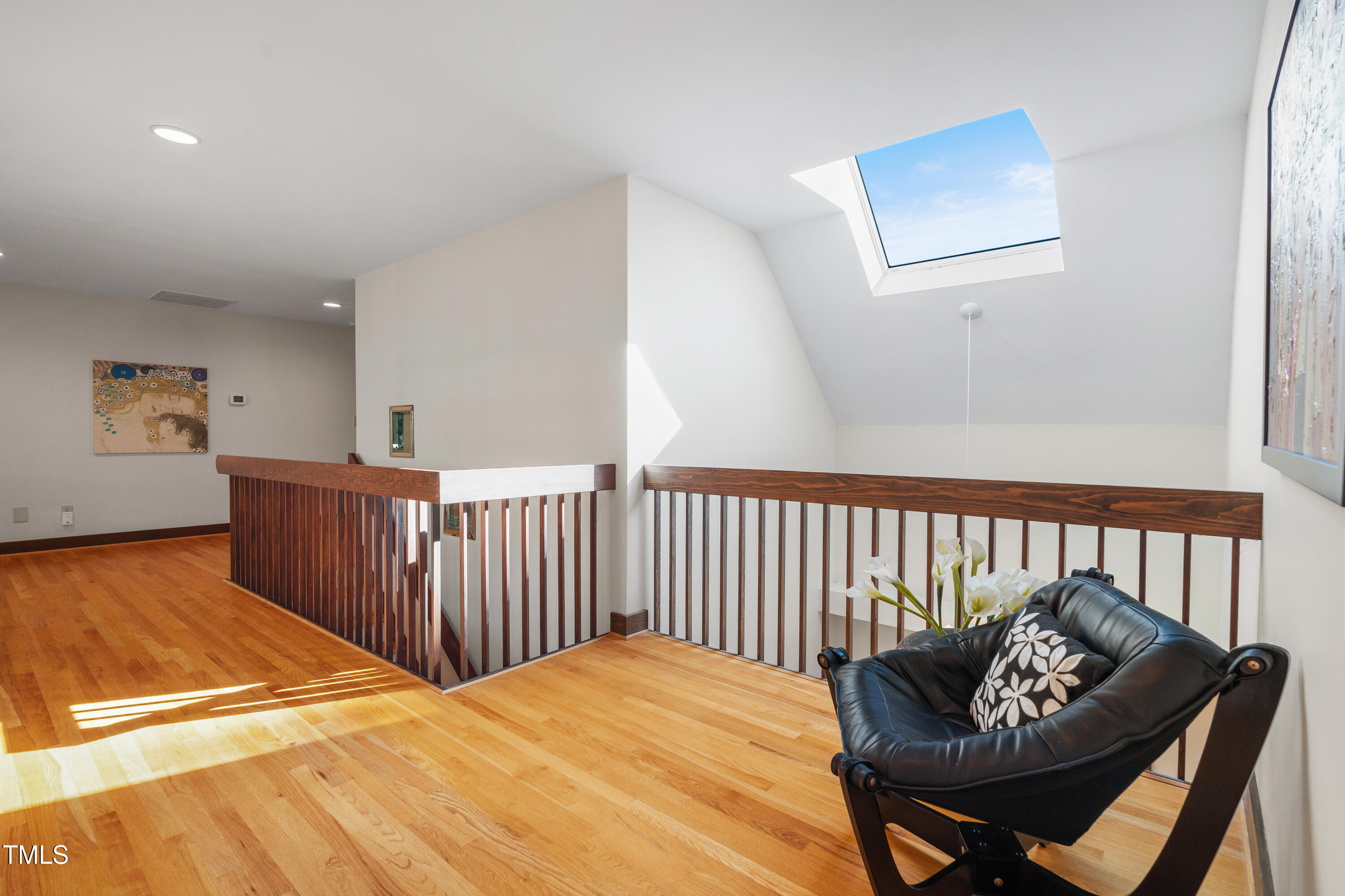 12117 Cliffside Circle Raleigh, NC 27614 - Photo 35 of 63 a living room with furniture and a wooden floor