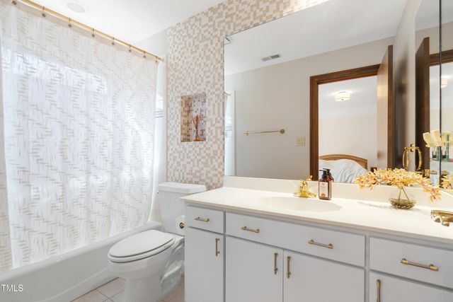 a utility room with cabinets