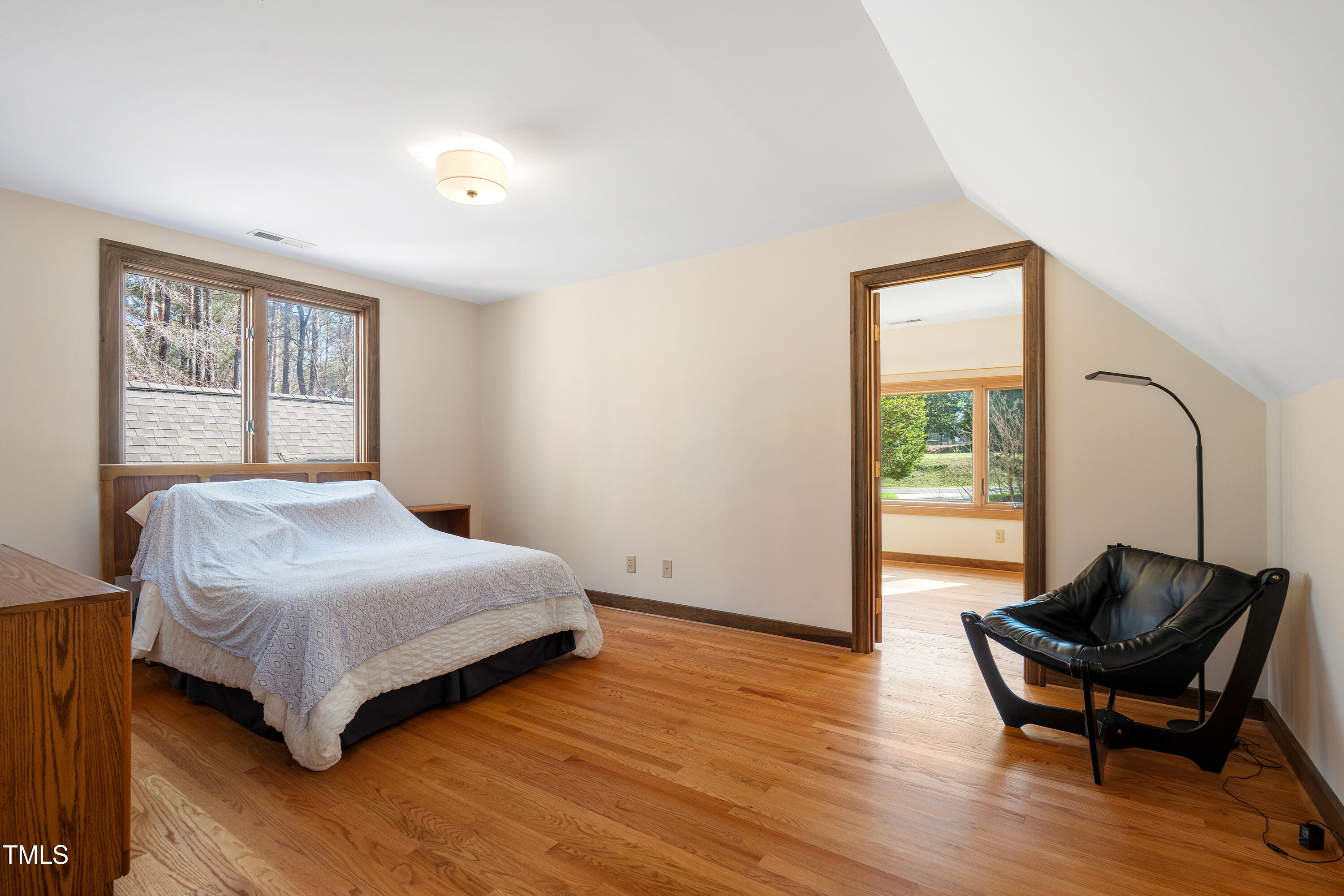 12117 Cliffside Circle Raleigh, NC 27614 - Photo 40 of 63 a bedroom with a bed and a window