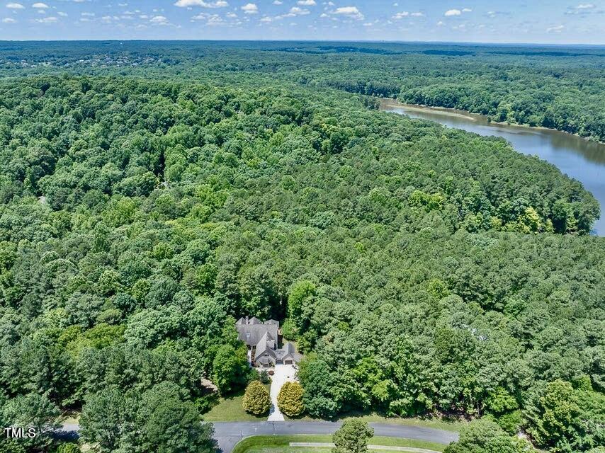 12117 Cliffside Circle Raleigh, NC 27614 - Photo 4 of 63 a view of a lush green space