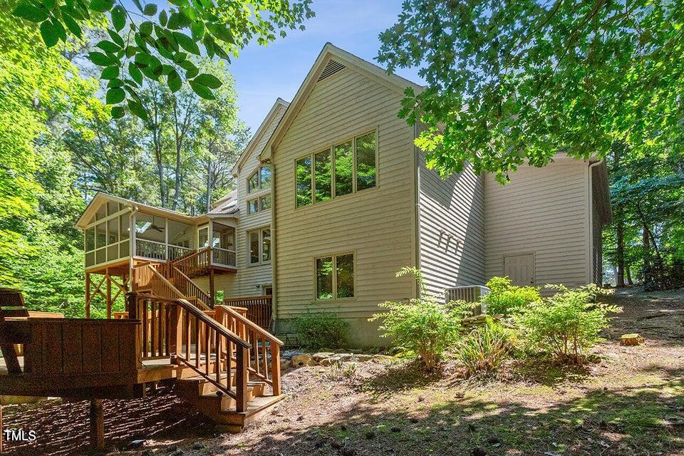 12117 Cliffside Circle Raleigh, NC 27614 - Photo 48 of 63 a front view of a house with garden