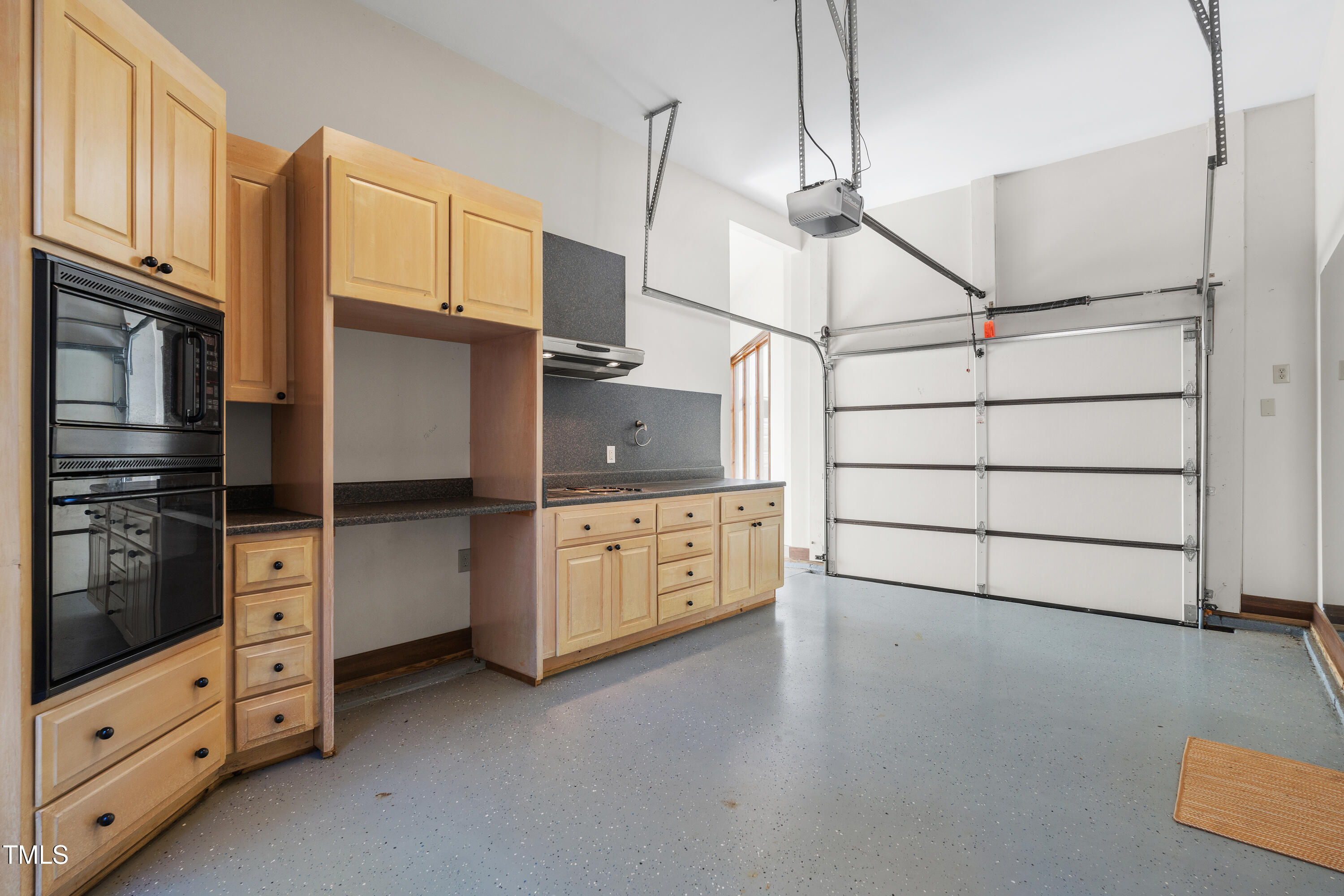 12117 Cliffside Circle Raleigh, NC 27614 - Photo 54 of 63 a utility room with cabinets