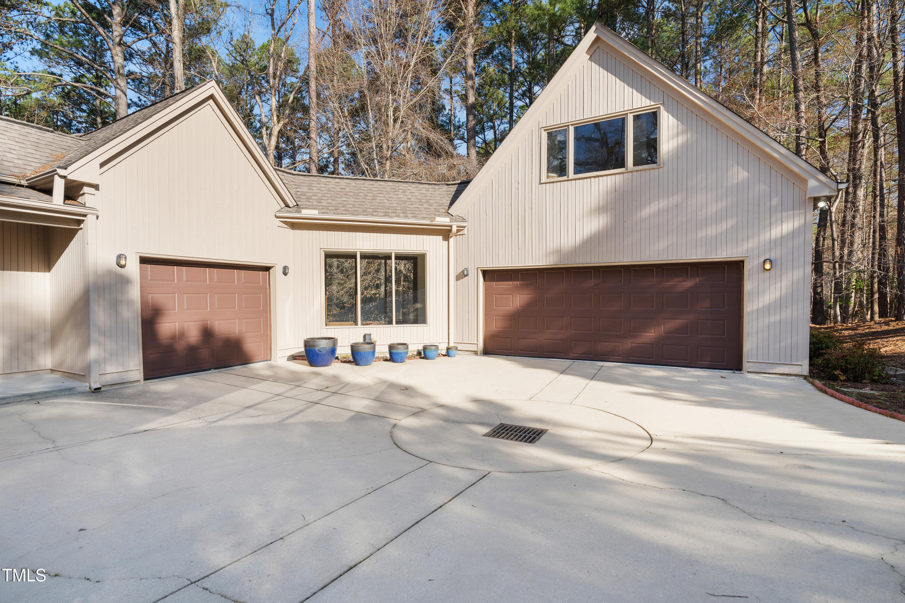 12117 Cliffside Circle Raleigh, NC 27614 - Photo 58 of 63 a front view of a house with a yard and garage