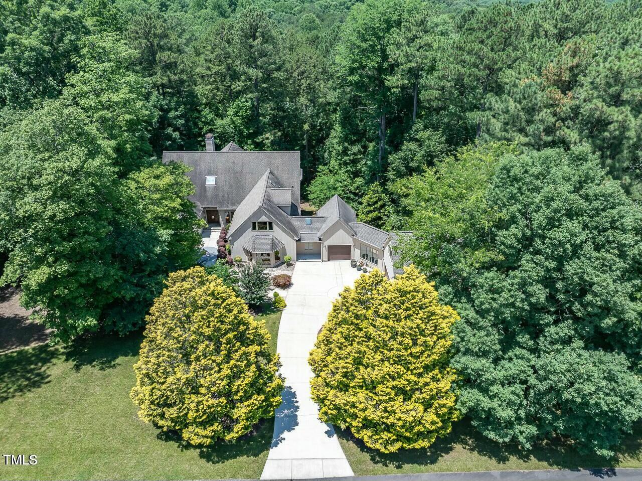 12117 Cliffside Circle Raleigh, NC 27614 - Photo 59 of 63 an aerial view of a house with a yard and garden