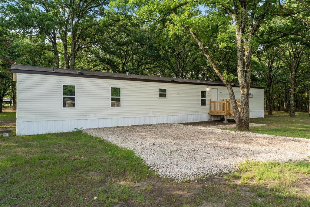 367 Box Road Gun Barrel City, TX 75156 - Photo 3 of 25 a view of a backyard of the house