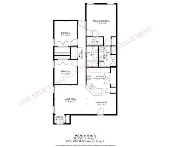 a picture of a bench in front of a wall