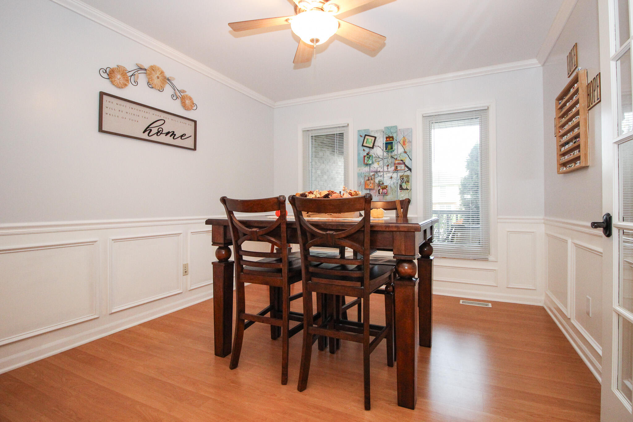 1403 Edgewater Road Crown Point, IN 46307 - Photo 16 of 43 a view of a dining room with furniture and wooden floor