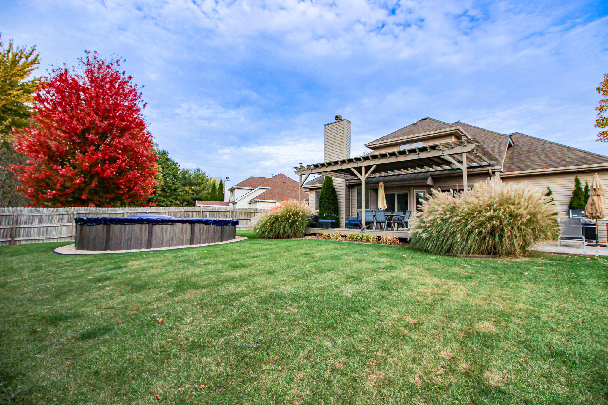 1403 Edgewater Road Crown Point, IN 46307 - Photo 2 of 43 a view of a house with a yard and deck