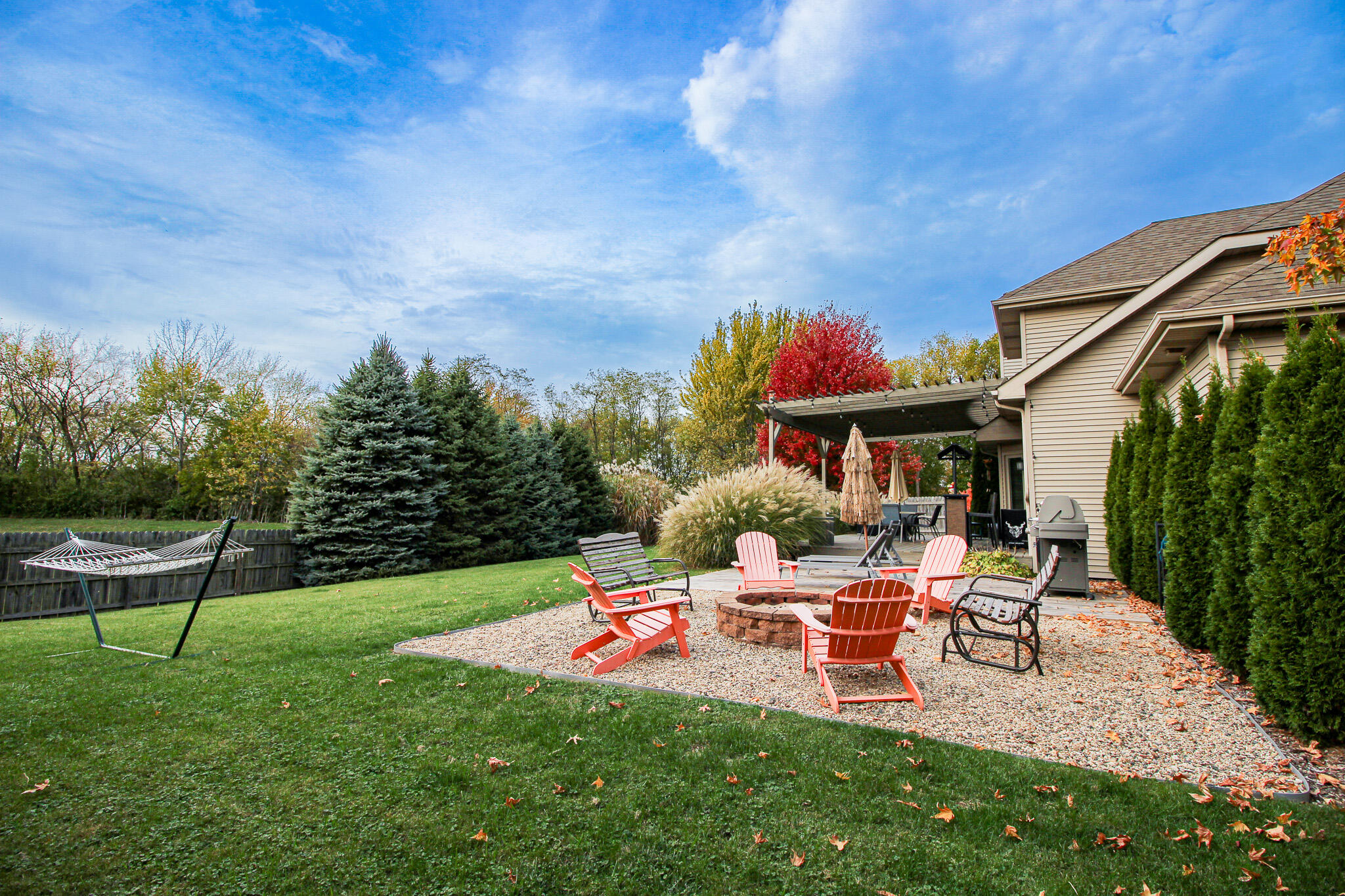 1403 Edgewater Road Crown Point, IN 46307 - Photo 3 of 43 a view of a house with backyard porch and sitting area