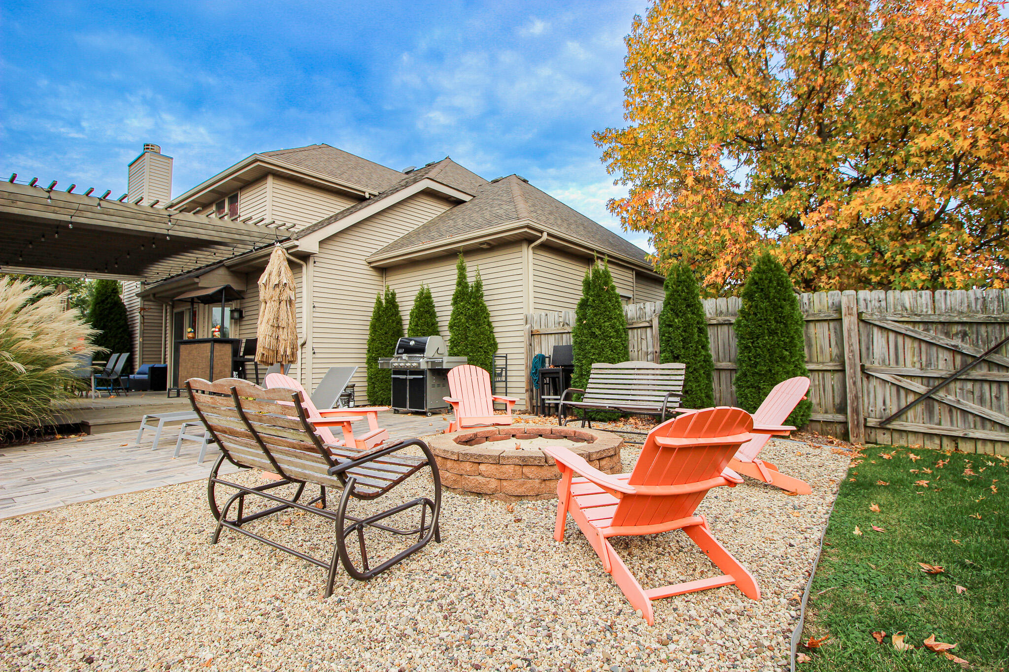 1403 Edgewater Road Crown Point, IN 46307 - Photo 41 of 43 a view of a patio with a table and chairs under an umbrella