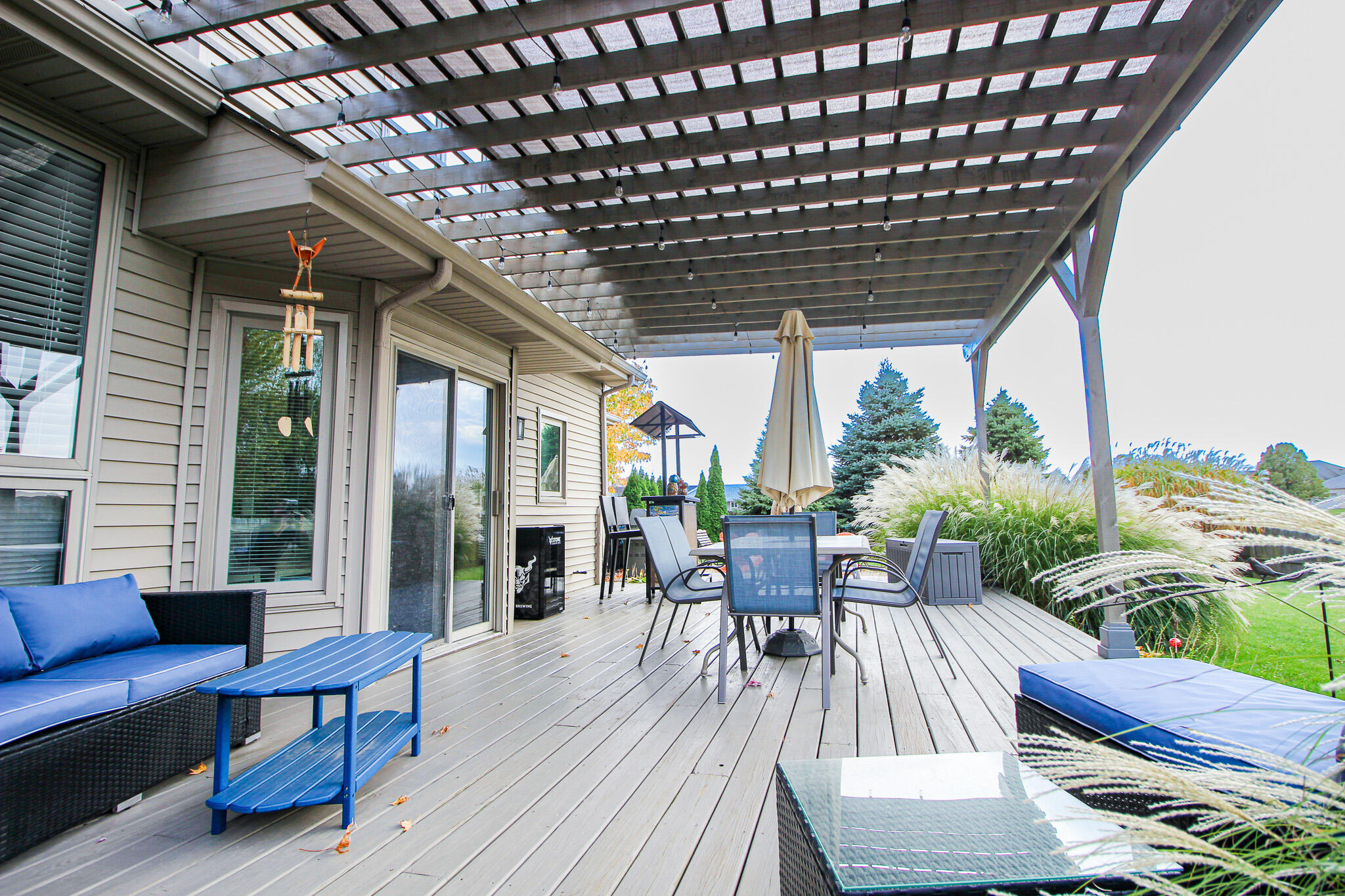 1403 Edgewater Road Crown Point, IN 46307 - Photo 43 of 43 a view of a patio with table and chairs and wooden floor