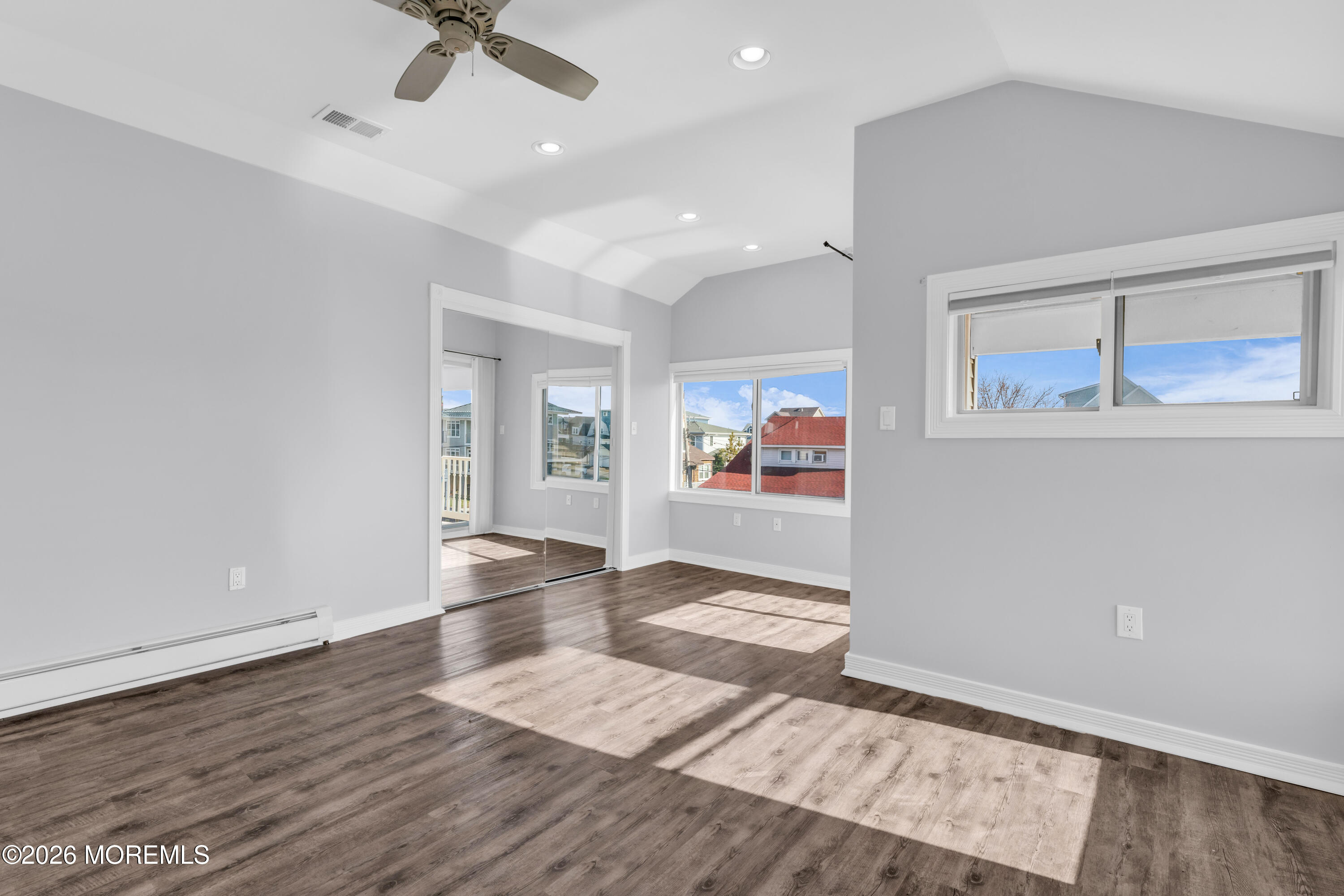 2 Bedle Place Highlands, NJ 07732 - Photo 13 of 25 a view of an empty room with window and wooden floor