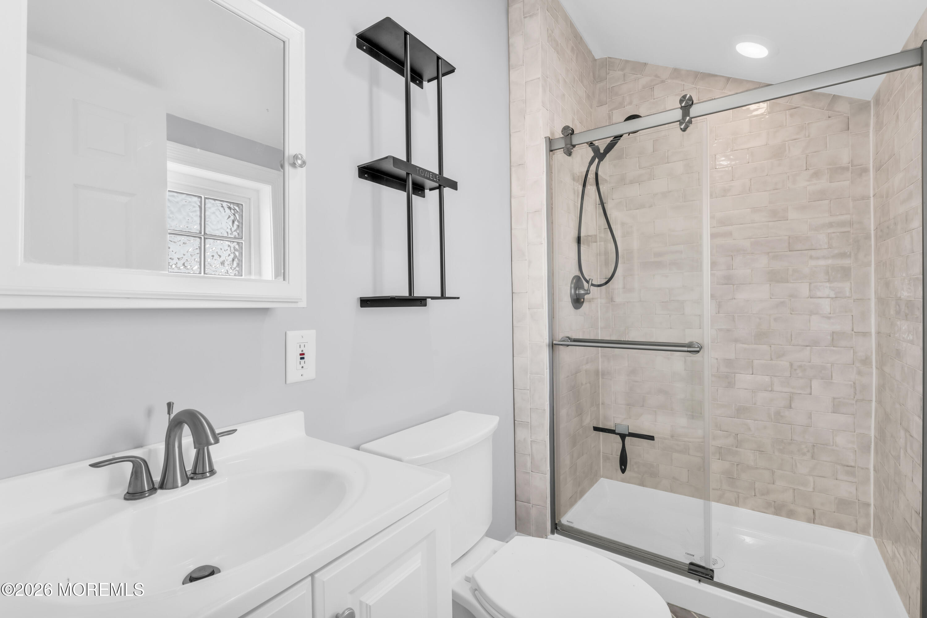 2 Bedle Place Highlands, NJ 07732 - Photo 19 of 25 a bathroom with a sink toilet and shower