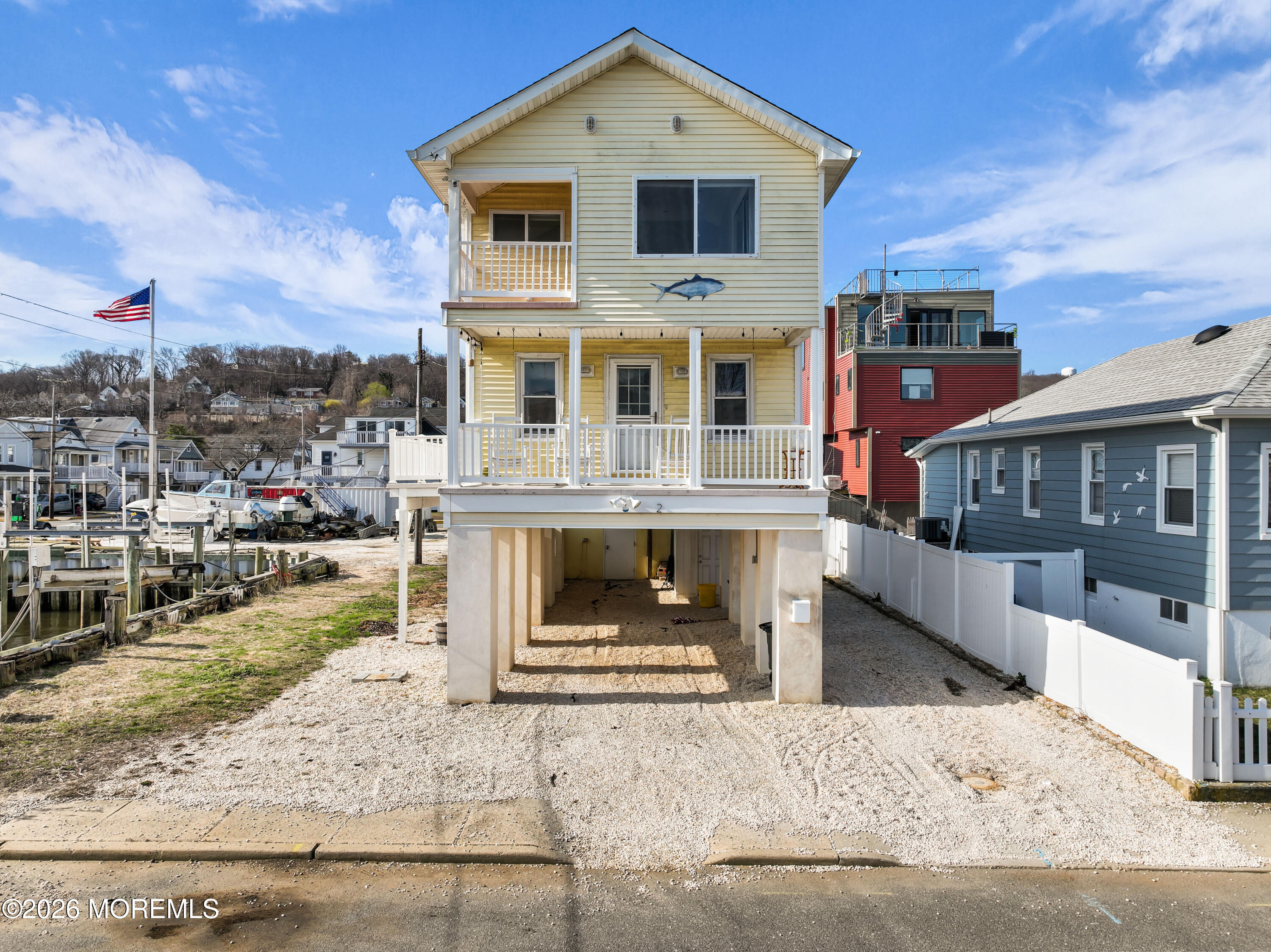 2 Bedle Place Highlands, NJ 07732 - Photo 21 of 25 a front view of a house with a yard