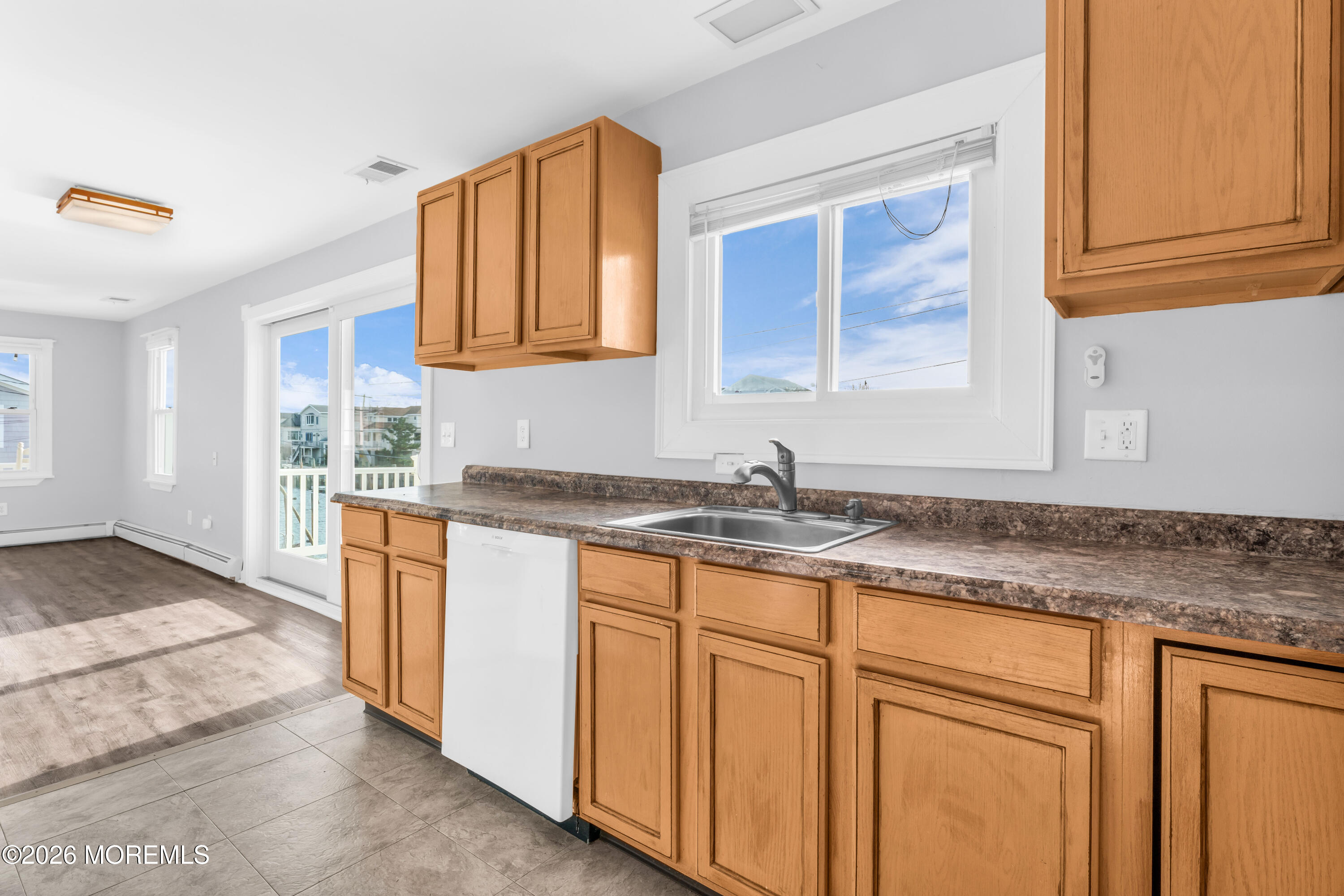 2 Bedle Place Highlands, NJ 07732 - Photo 7 of 25 a kitchen with granite countertop a sink and a stove