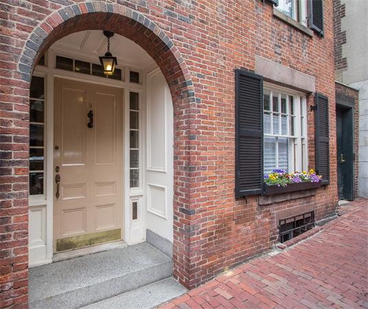 a front view of a house with a shower